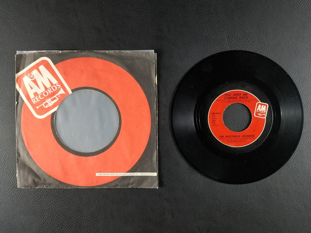 The Brothers Johnson - You Keep Me Coming Back / Deceiver (1984, 7'' Single)