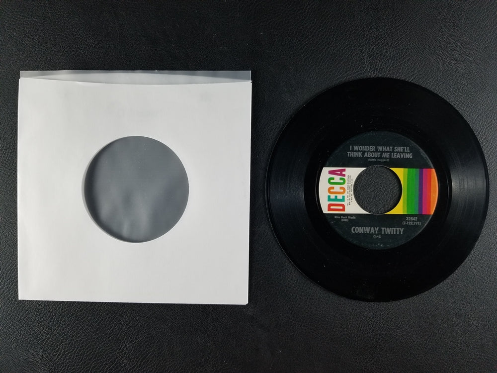 Conway Twitty - I Wonder What She'll Think About Me Leaving (1970, 7'' Single)